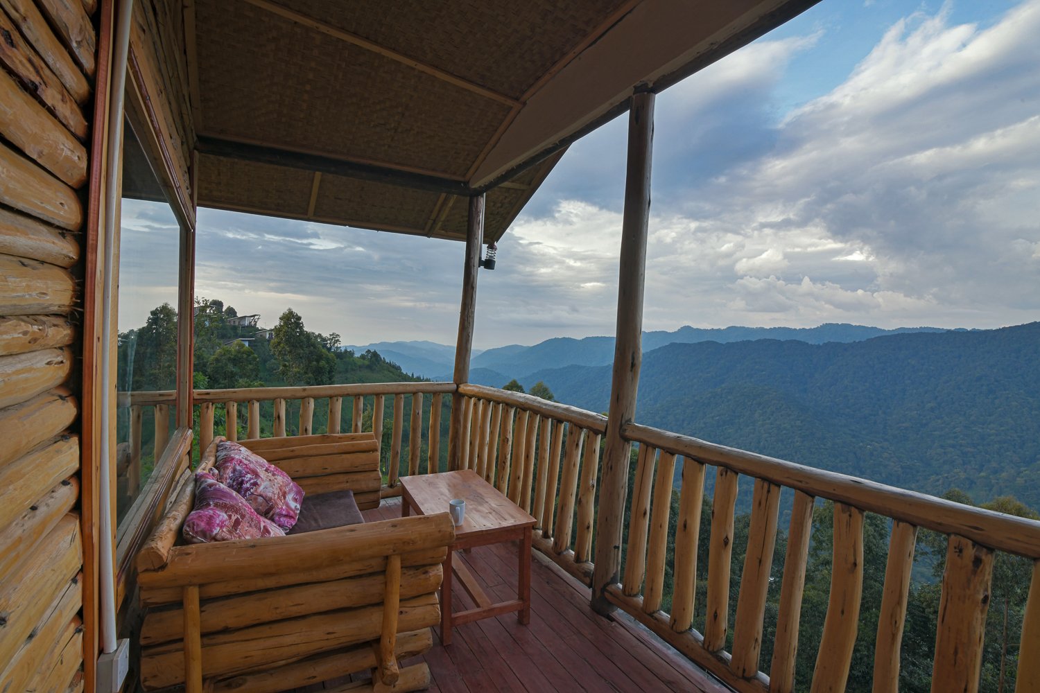 Stunning rainforest views from the balcony of Orugano Bwindi Lodge, a premier eco-friendly bwindi lodge in Uganda